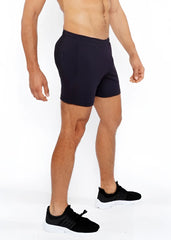 Black textured mesh stretch performance shorts with a sleek form fitting design and subtle side pockets