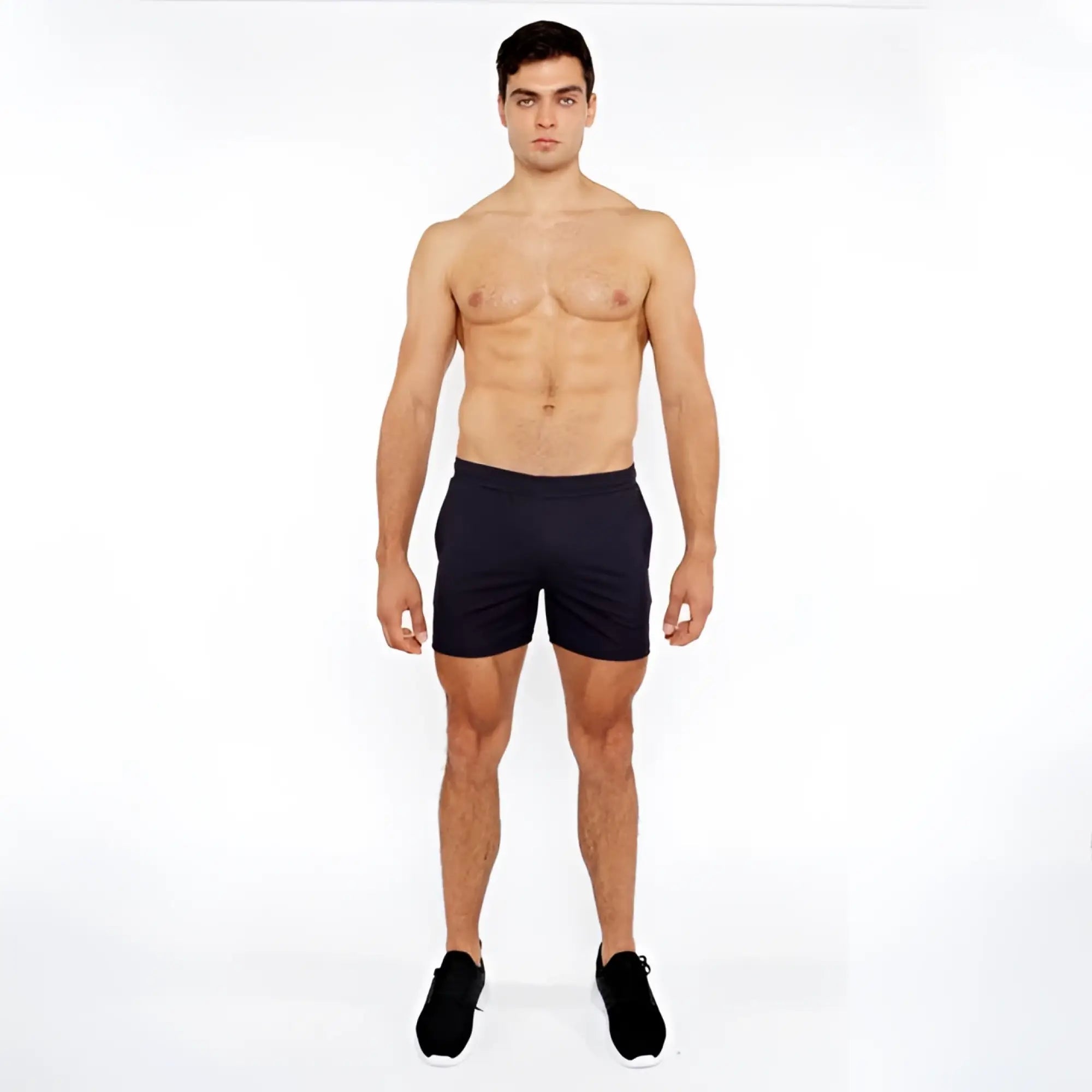 Black textured mesh stretch performance shorts with minimalist design for athletic use shown from the front
