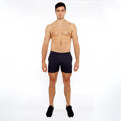 Black textured mesh stretch performance shorts with minimalist design for athletic use shown from the front