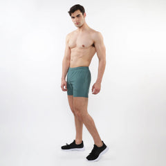 Teal textured mesh stretch performance athletic shorts with sleek modern design and subtle side pockets