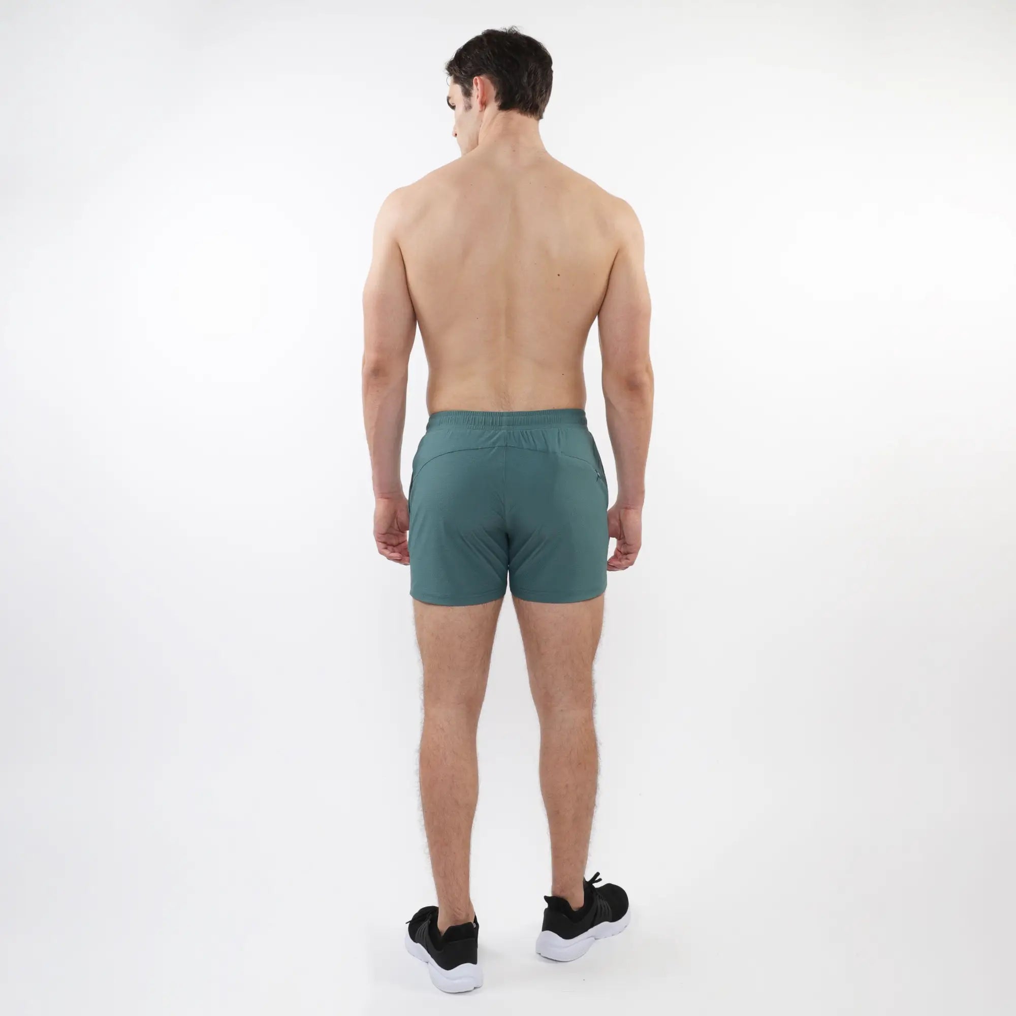 Teal textured mesh stretch performance shorts with sleek modern design and elastic waistband for athletic use