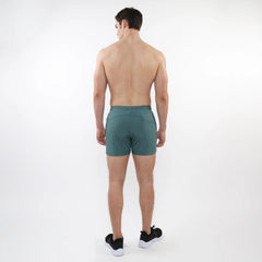Teal textured mesh stretch performance shorts with sleek modern design and elastic waistband for athletic use