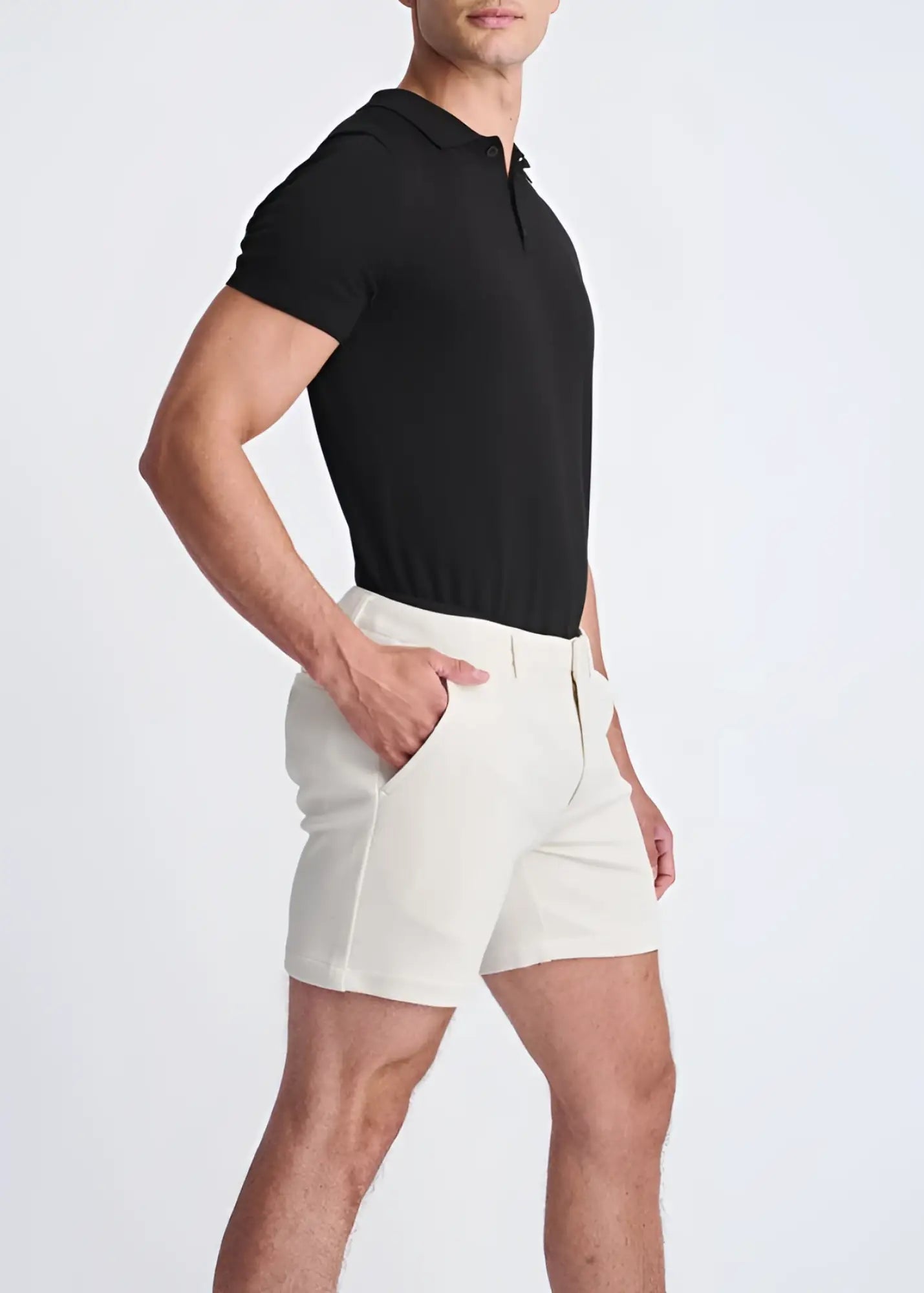 Cream-colored textured stretch knit chino shorts with a modern tailored cut and subtle side seam detailing