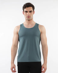 A sleek teal textured stretch mesh performance tank top with moisture-wicking fabric and a round neckline