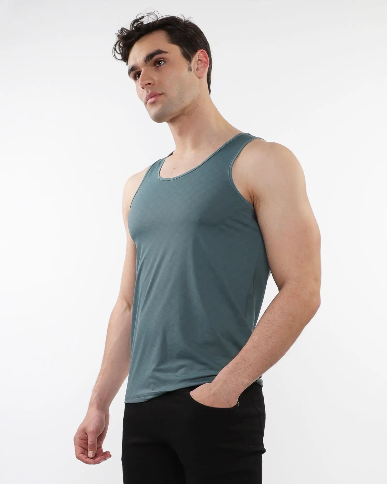 A sleek teal textured stretch mesh performance tank with smooth form-fitting sleeveless design