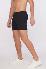 Black textured stretch performance shorts with sleek form-fitting design and subtle side pockets for athletic use