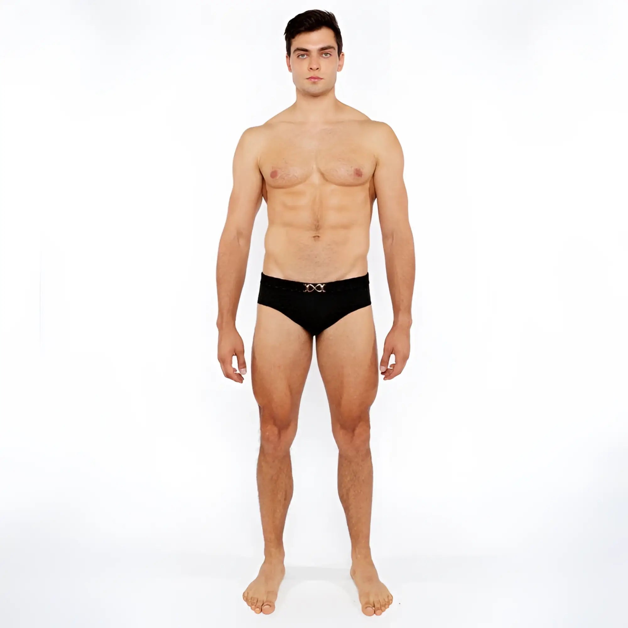 Black textured swim brief with front buckle and silver metallic x shaped logo on the waistband