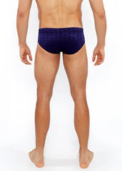 Navy blue textured swim brief with front buckle and geometric pattern ideal for stylish beachwear