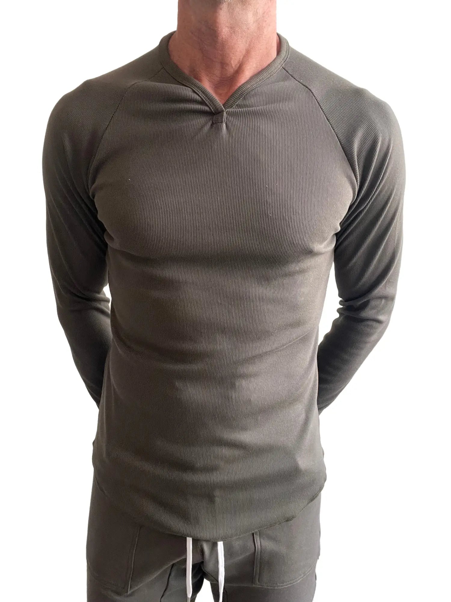 A sleek olive green thermal v neck long sleeve shirt with ribbed fitted design for layering and warmth