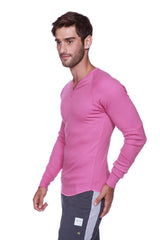 A vibrant pink thermal v-neck long sleeve shirt made of soft stretchy ribbed fabric for cozy warmth