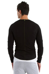 Black thermal v-neck long sleeve athletic top with back zipper detail shown from the back side