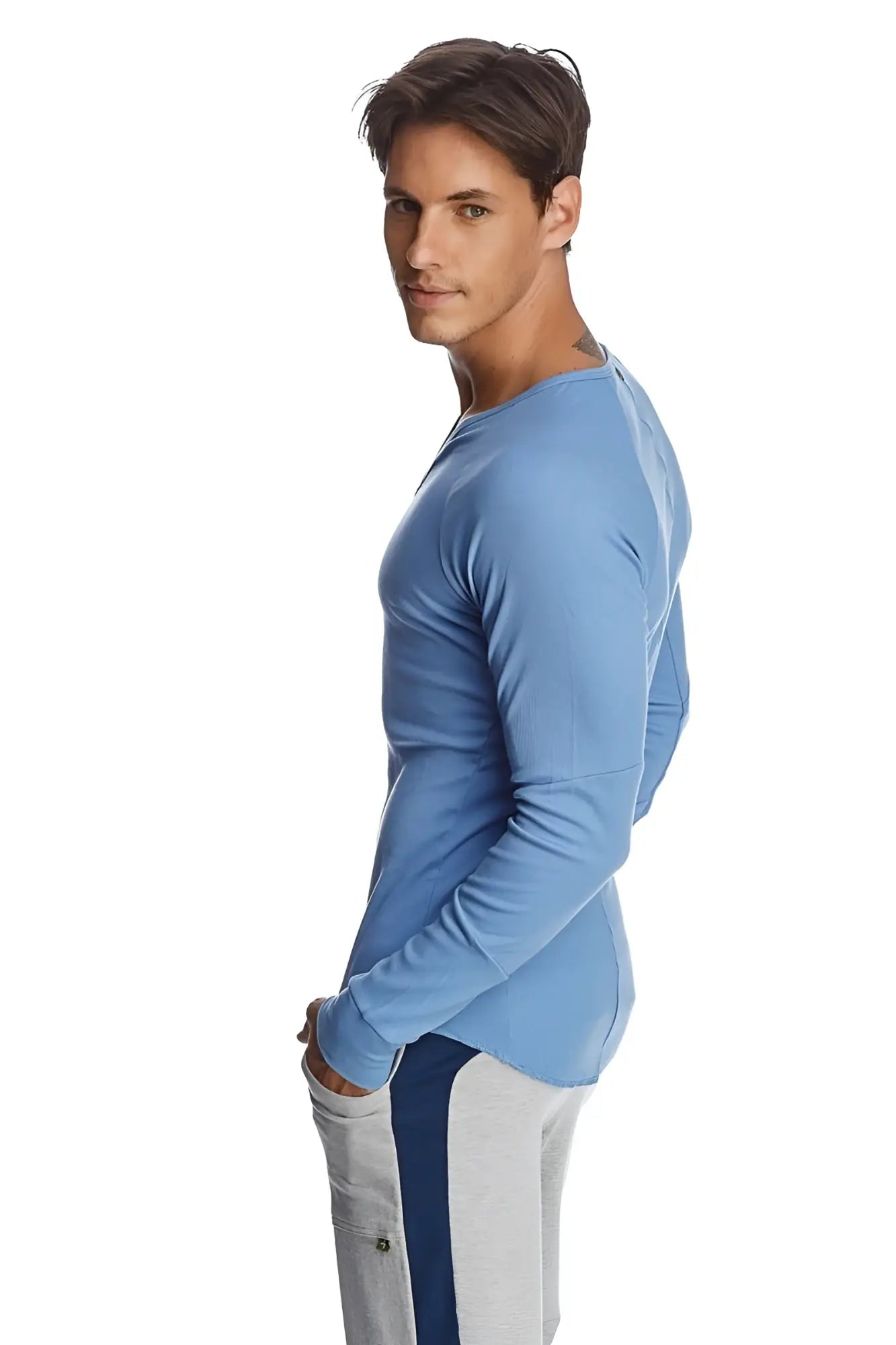 A light blue thermal long sleeve ribbed knit shirt with a rounded neckline and v-neck style perfect for layering