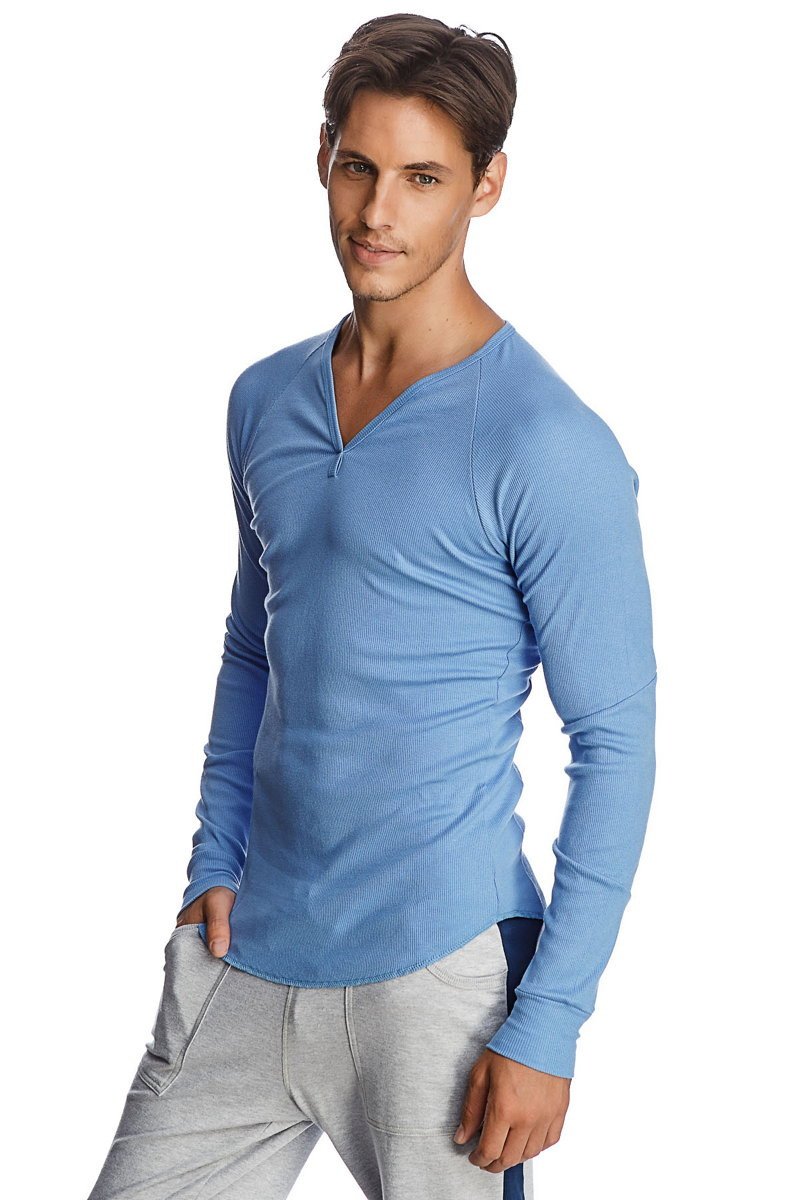 A light blue thermal v-neck long sleeve shirt with ribbed texture and subtle seam detailing