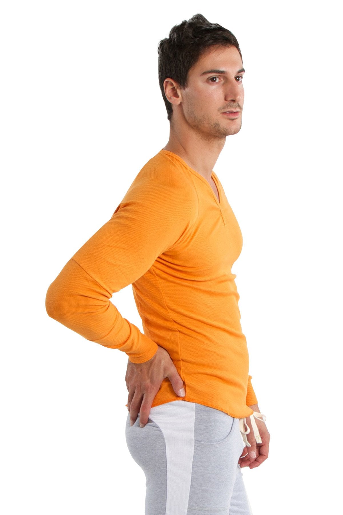 Vibrant orange thermal v-neck long sleeve shirt with snug fit and subtle ribbed texture for warmth and style