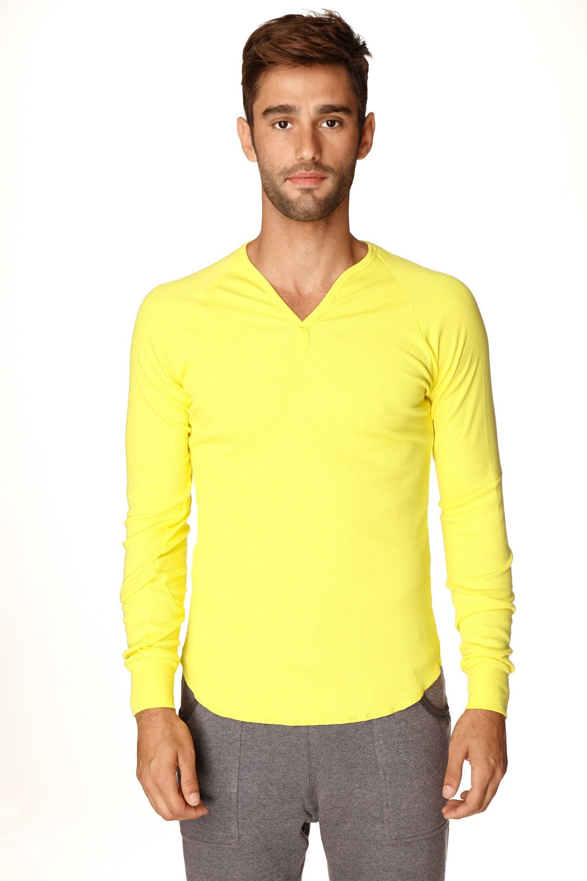 Bright yellow thermal v-neck long sleeve shirt made of warm material for cold weather layering