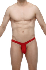 Red thong by petitq made of smooth stretchy fabric with a small logo on the waistband showing the back side