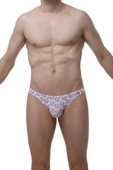 White petitq thong with a repeating pink cartoon pig face pattern designed for comfortable everyday wear