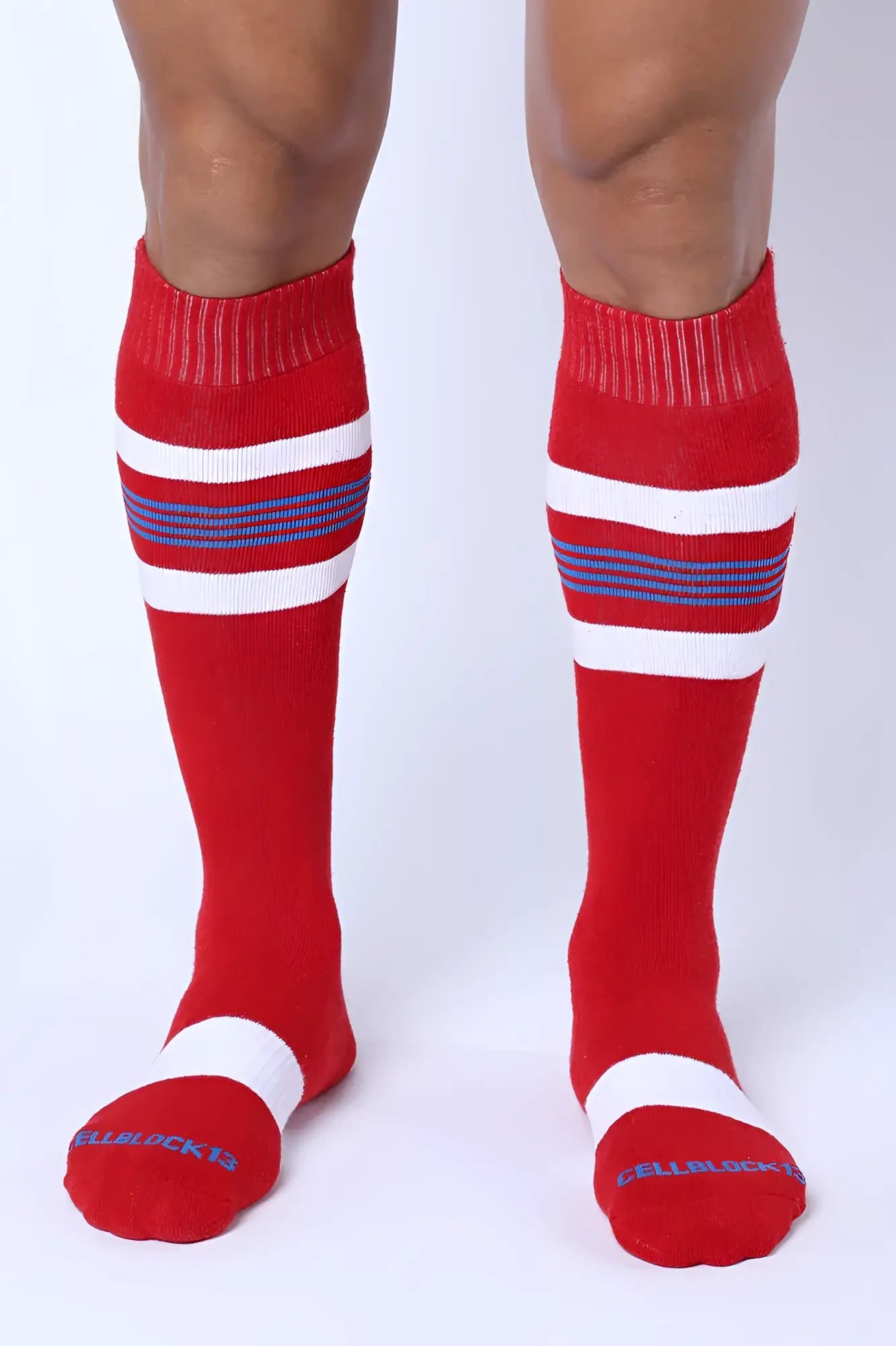 Red tight end knee high socks with white and blue stripes featuring ribbed cuff and toe band in four colors