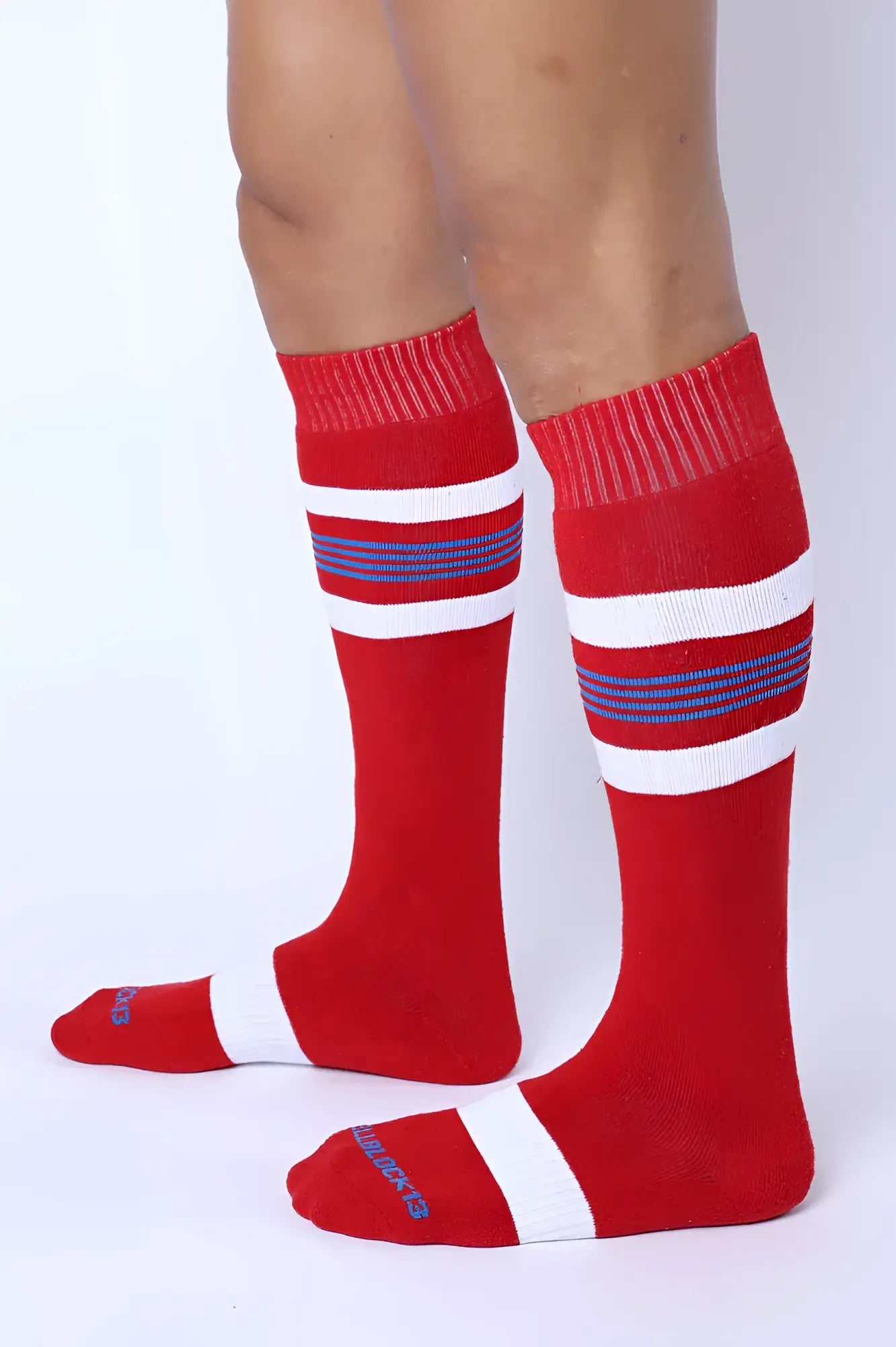 Tight end knee high socks in red with white and navy stripes featuring ribbed cuff and toe for comfortable wear