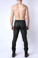 Black leather toro zipper pant with a sleek form-fitting design and silver zipper accents along the back seam