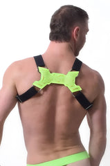 Neon green x-shaped back support with black straps on the back side of the transistor harness product