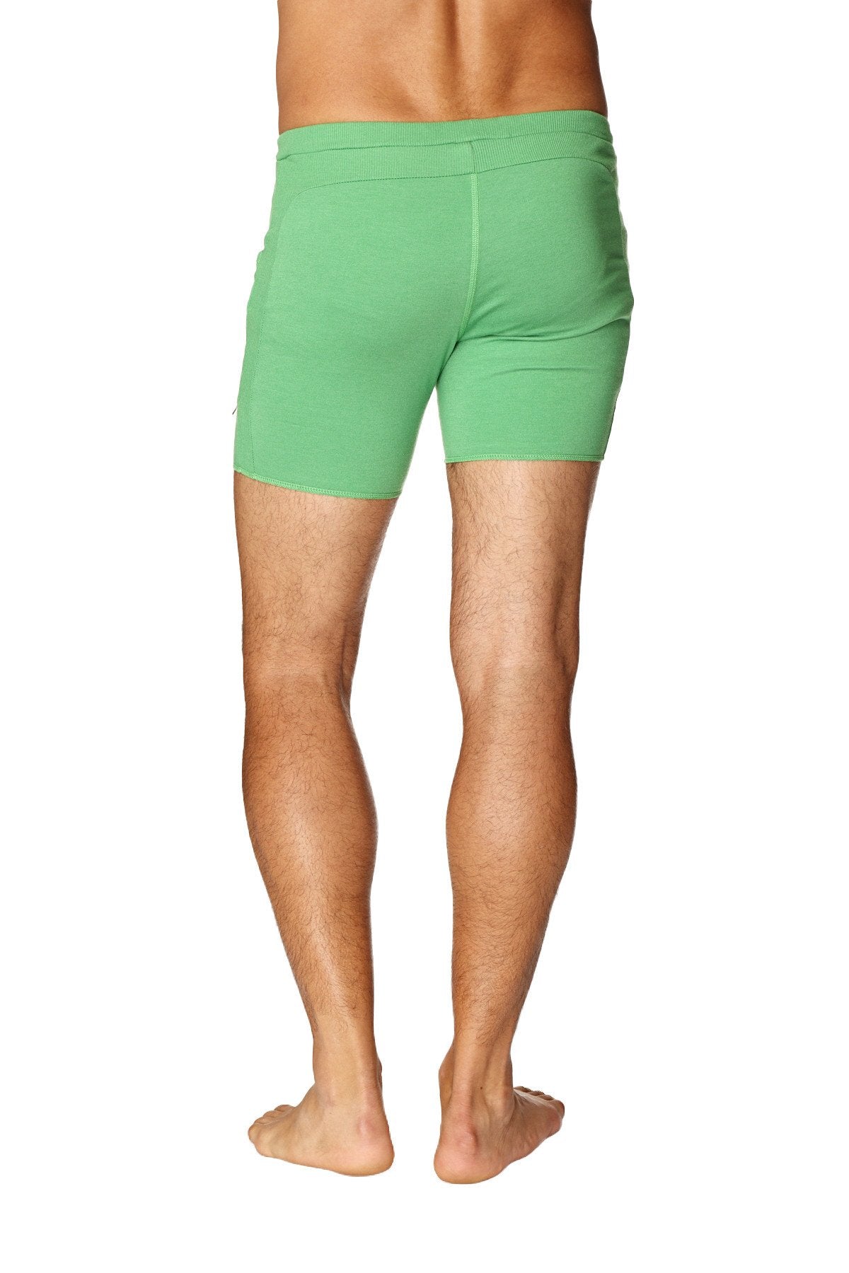 Green transition yoga shorts made from bamboo fabric with a snug fit and elastic waistband for athletic use