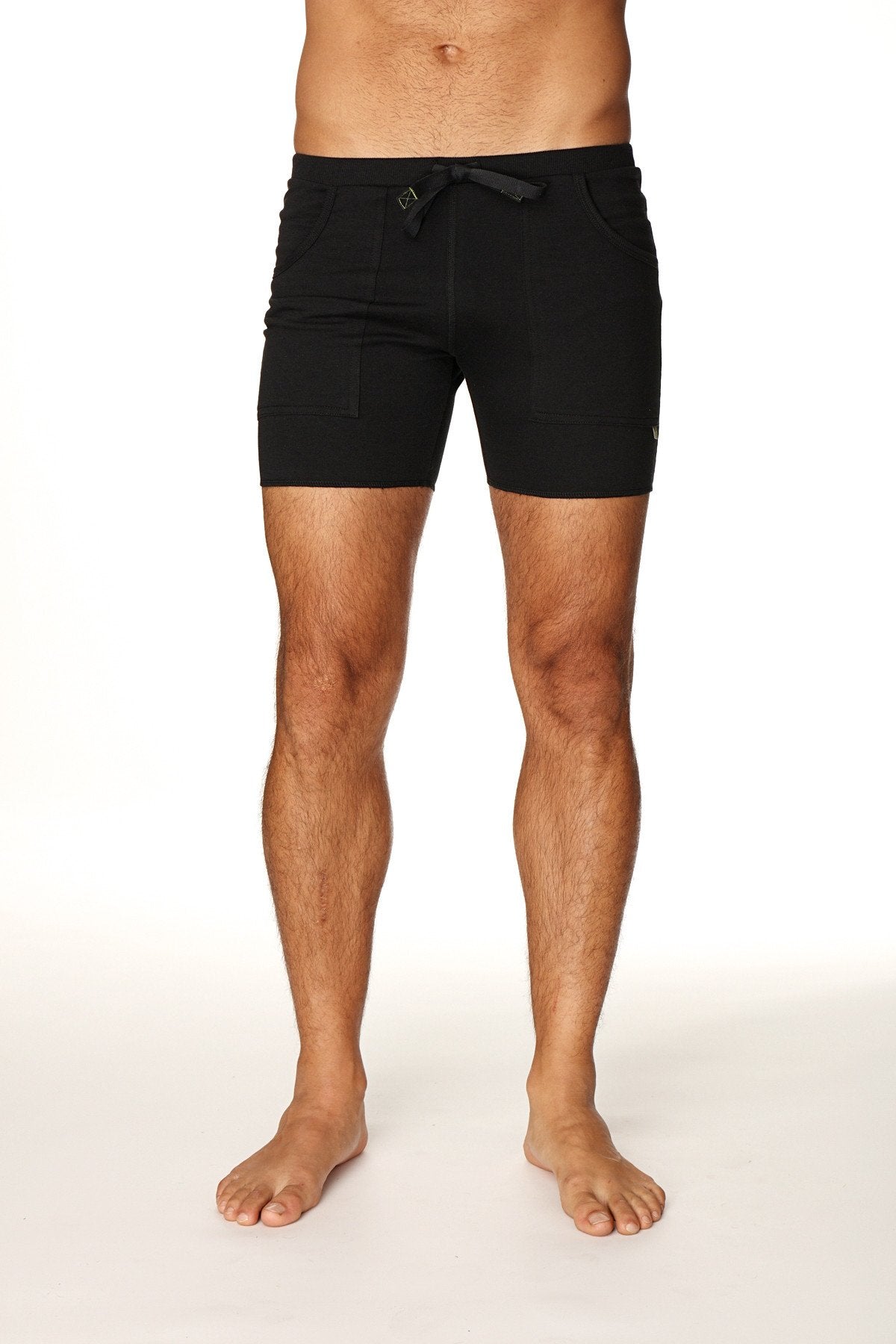 Black transition yoga shorts with sleek minimalist design and subtle waistband branding for comfortable workouts