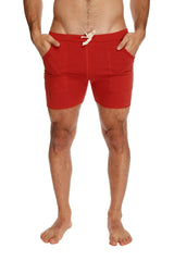 Transition yoga short in cinnabar red with drawstring waistband and side pockets designed for athletic use