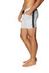Transition yoga short in grey with charcoal black side stripe and green logo designed for athletic use