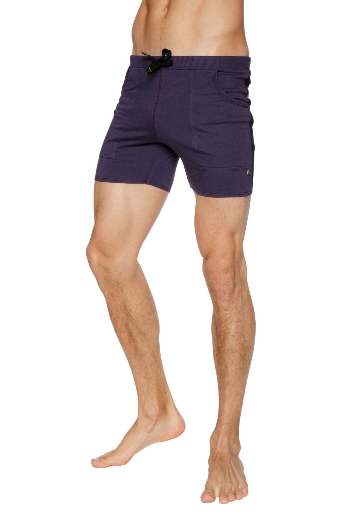 Purple transition yoga shorts with black drawstring waistband and side pockets for athletic wear