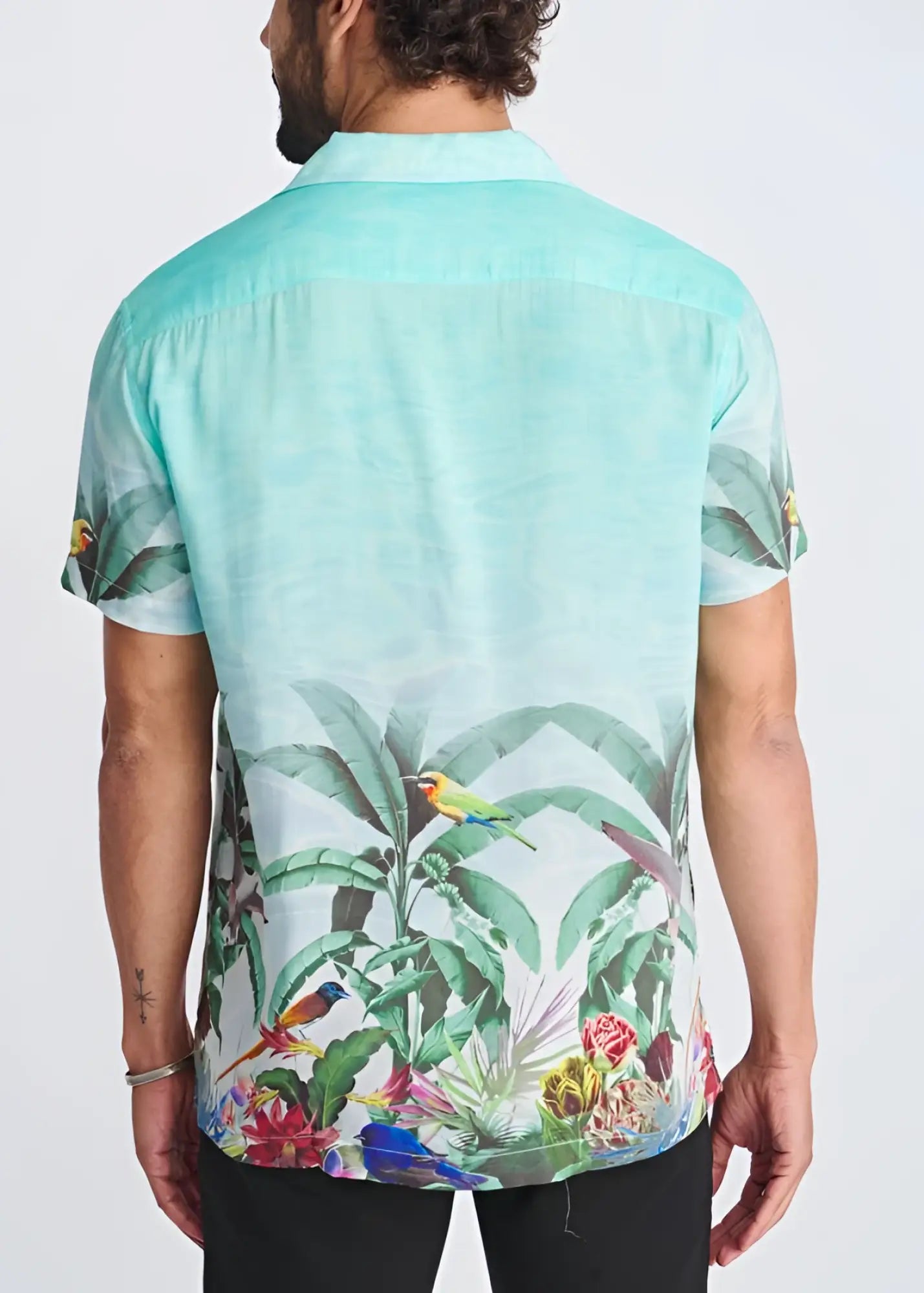 Tropics border print short-sleeved modal shirt in mint green with colorful birds and lush foliage, classic collar, relaxed fit
