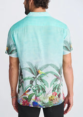 Tropics border print short-sleeved modal shirt in mint green with colorful birds and lush foliage, classic collar, relaxed fit