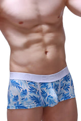 Blue tropical leaf patterned men’s boxer briefs trunk maeha with white elastic waistband for comfortable wear