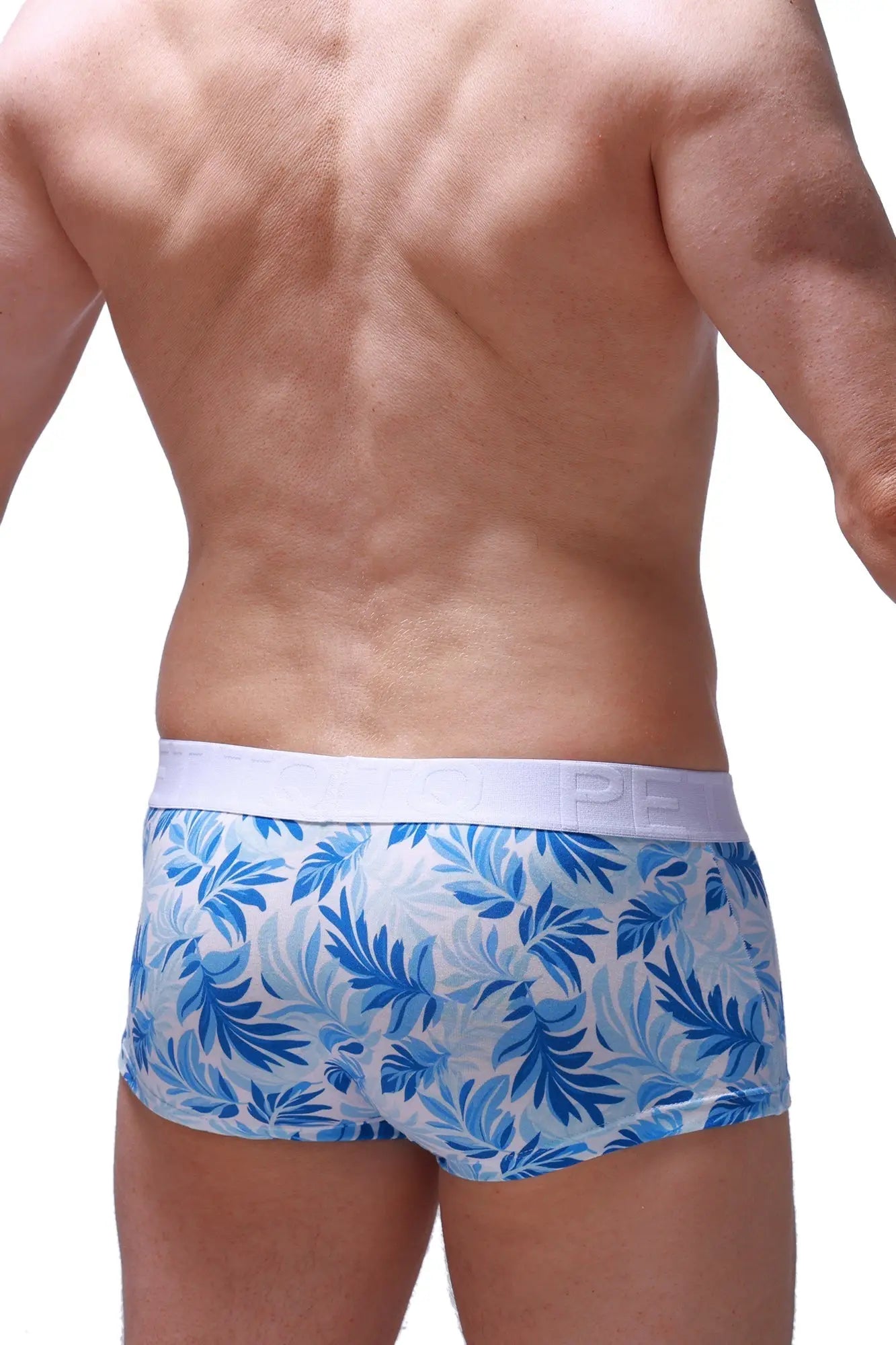 Blue and white tropical leaf patterned men’s briefs trunk maeha with solid white elastic waistband