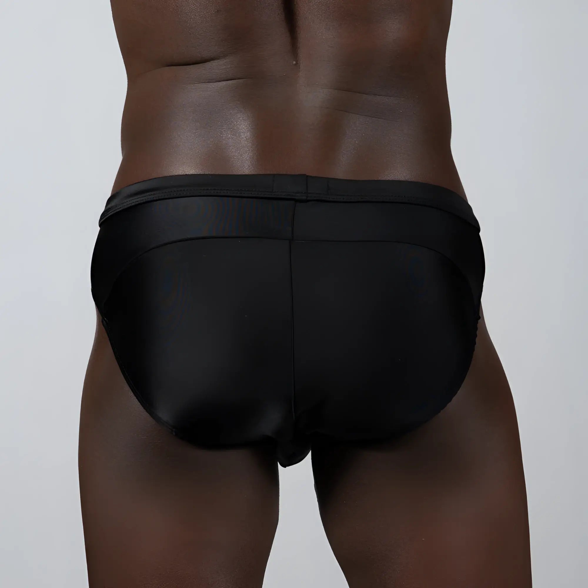 Black satin tulio bikini brief with a sleek form-fitting design and solid color for comfortable wear