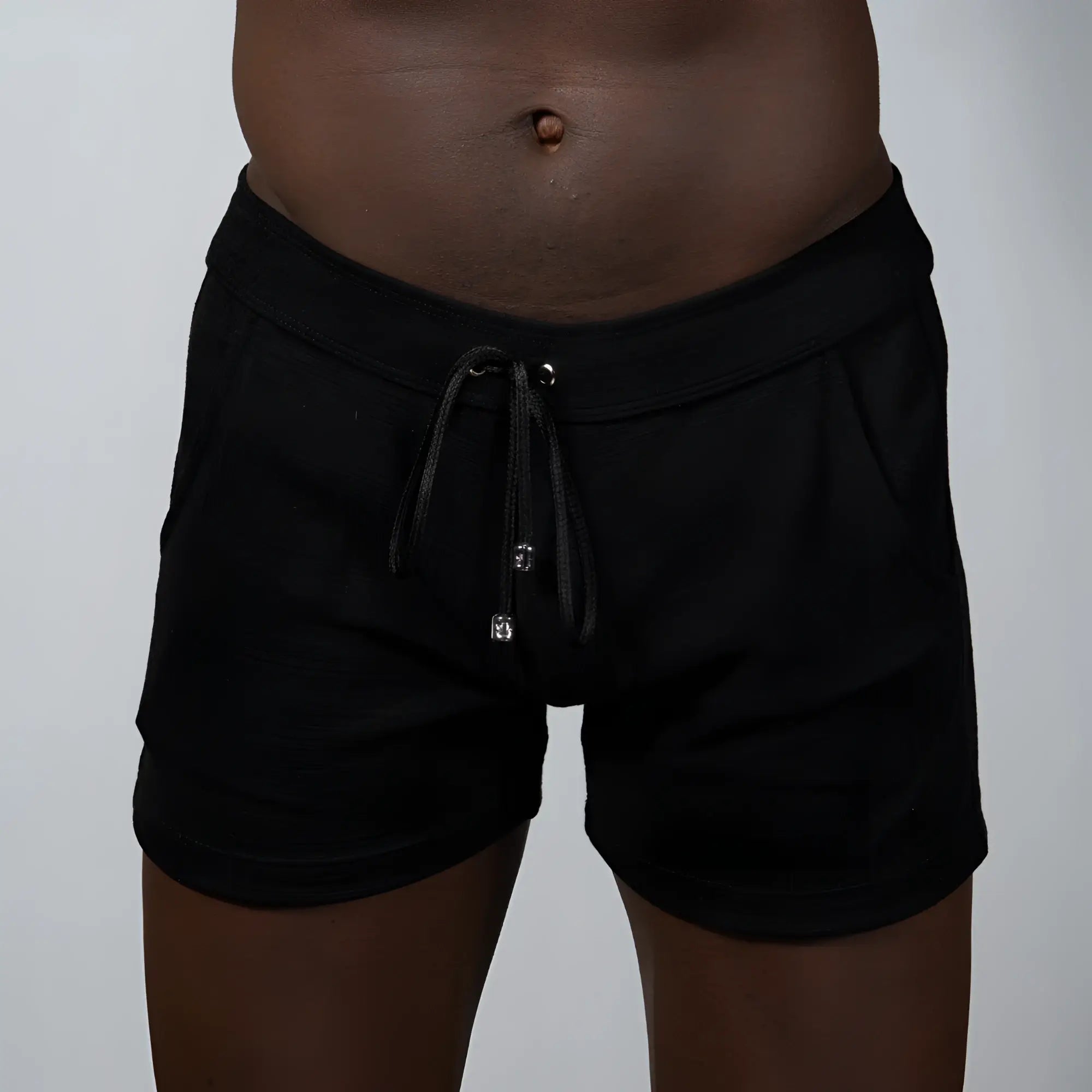 Black Tulio linen texture shorts with soft stretchy fabric and subtle side pockets for comfortable wear