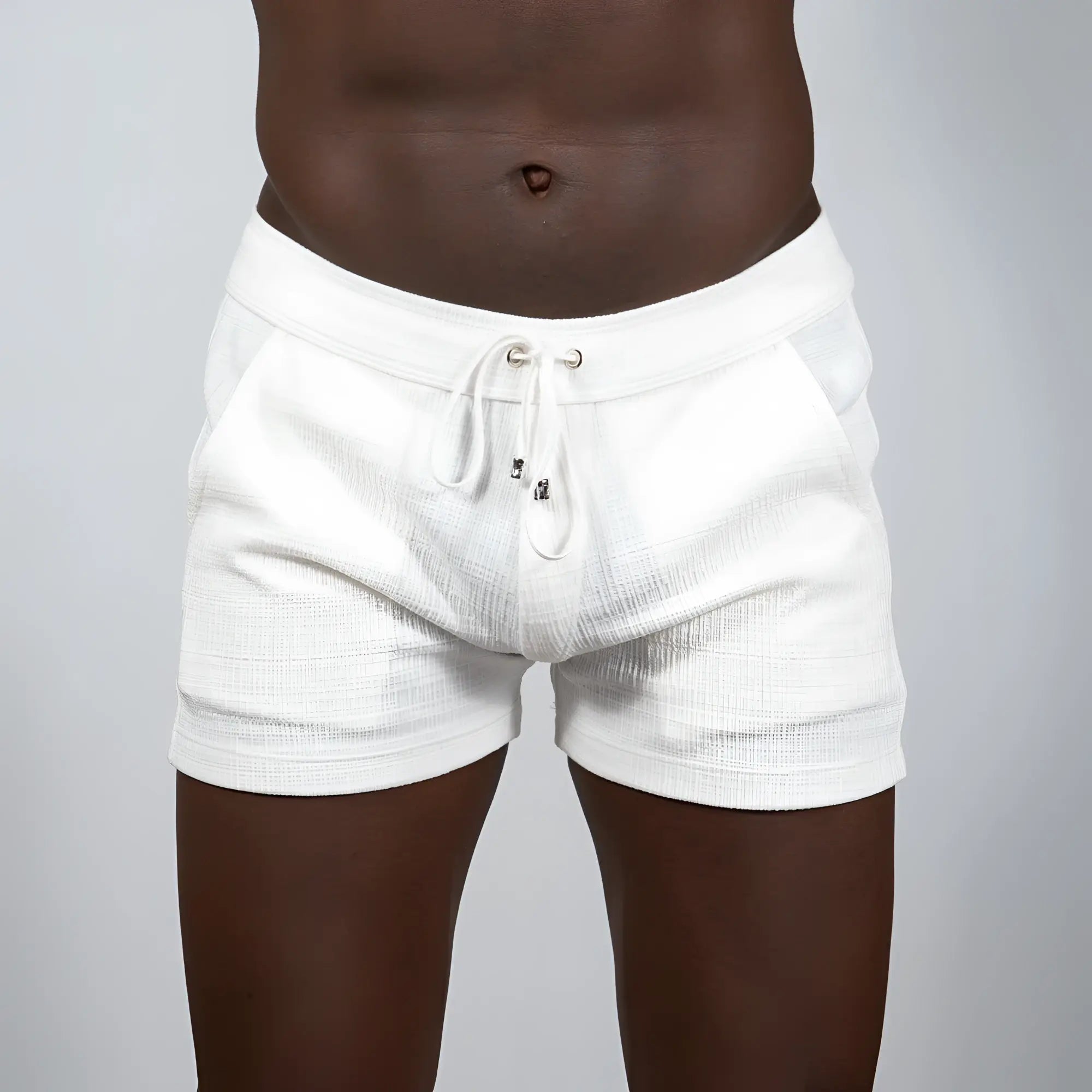 White tulio linen texture shorts with drawstring waistband and subtle horizontal ribbing in assorted colors