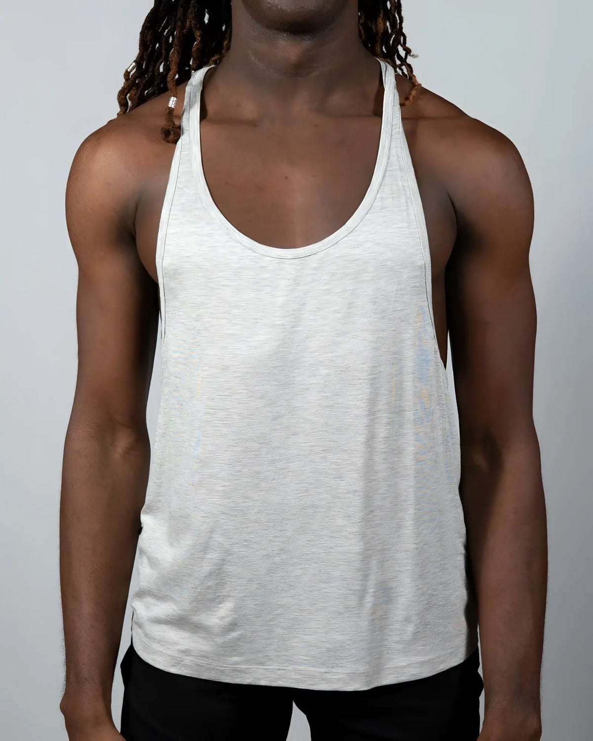 A light gray heathered cotton tulio racerback tank top with a classic racerback design shown from the back