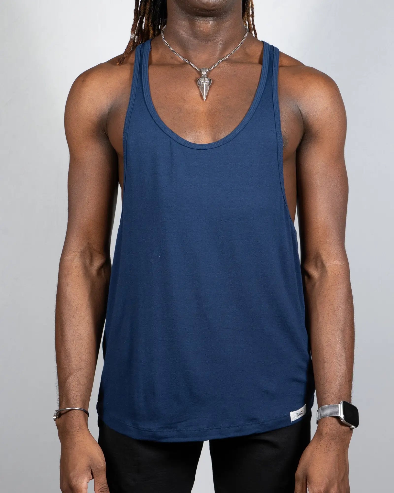 Navy blue tulio racerback tank sleeveless top made of lightweight fabric for active and casual wear in four colors available