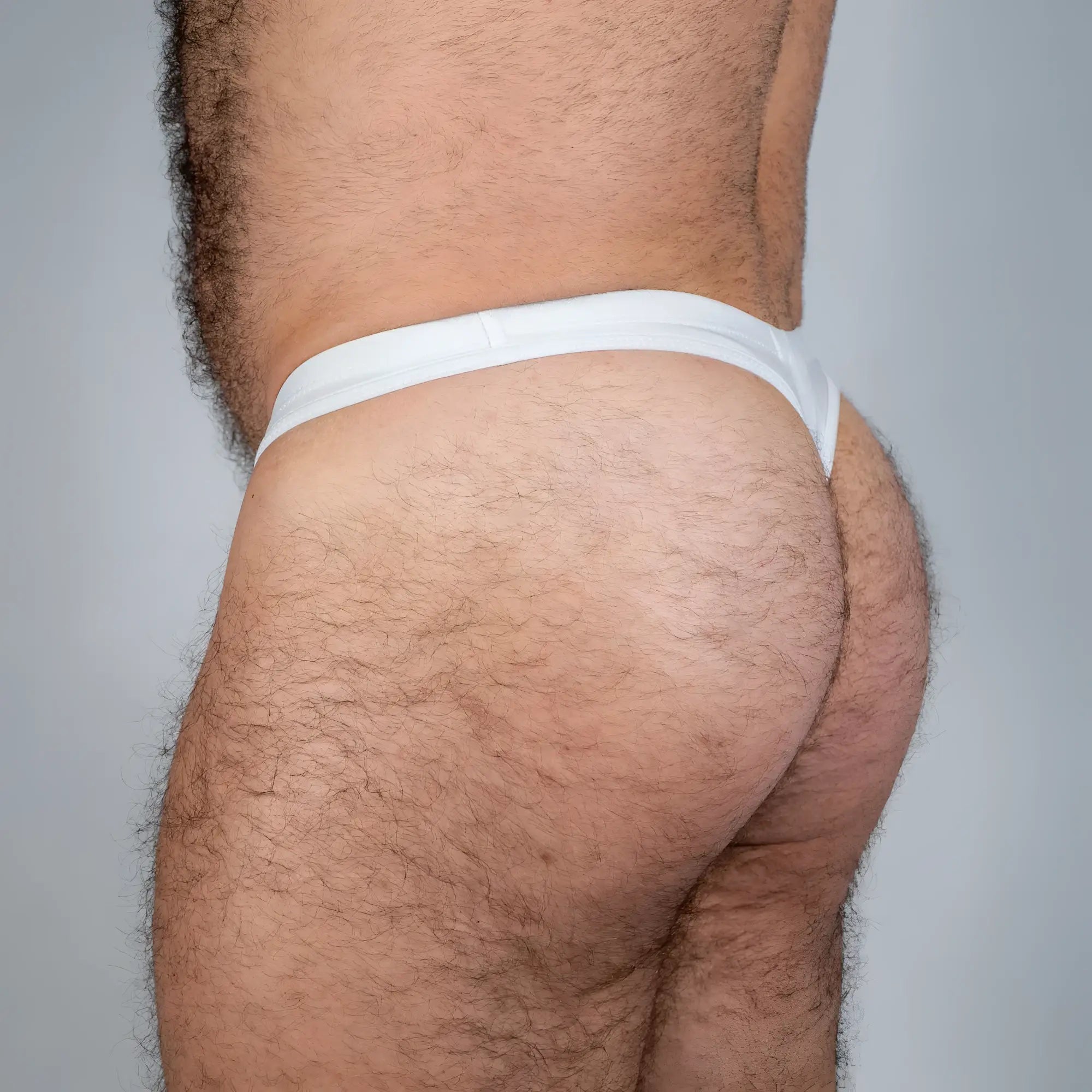 White cotton tulio swim thong solid briefs with a simple seamless design front view