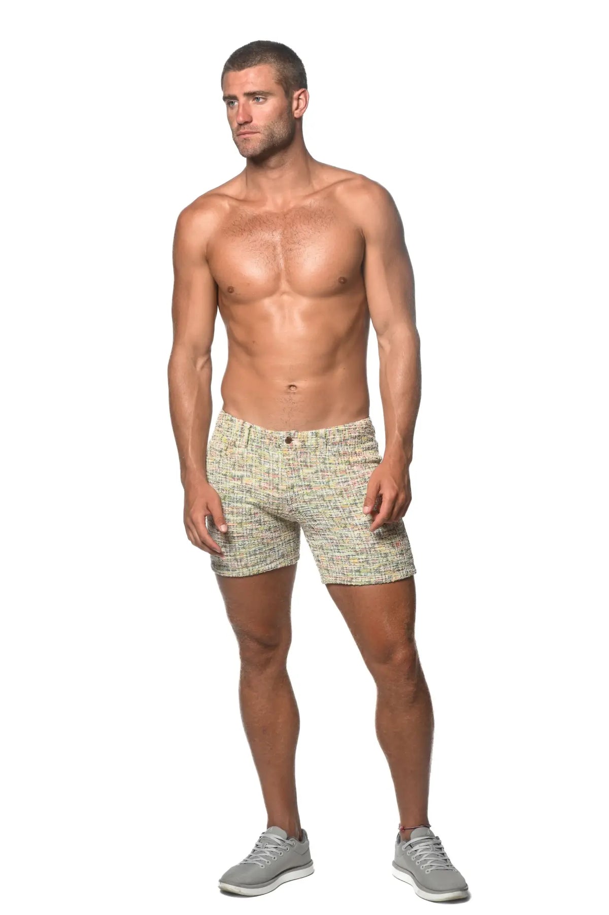 Beige and green tweed-look jacquard stretch knit jeans shorts with subtle woven texture in limited edition design