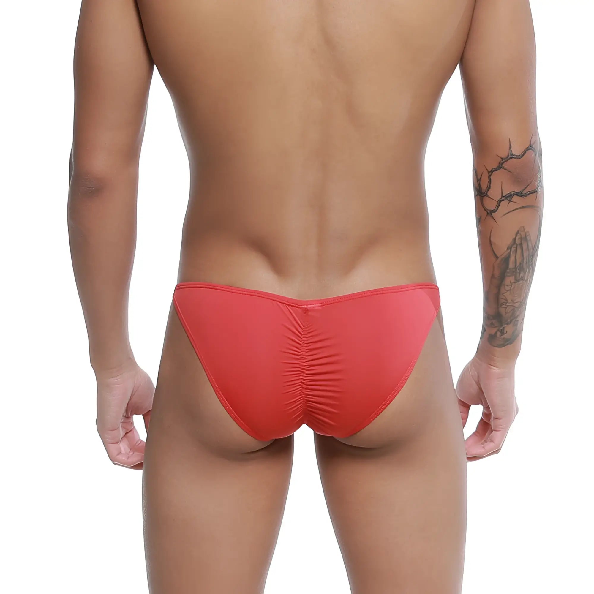 Red u-station me bikini swim trunks with ruched back design in form-fitting fabric for swimwear use shown from back side