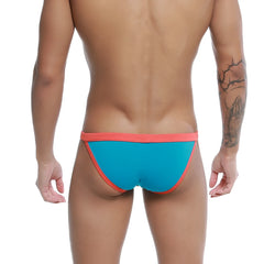 Bright turquoise and coral men’s briefs u station frisa bikini with a snug, form-fitting design
