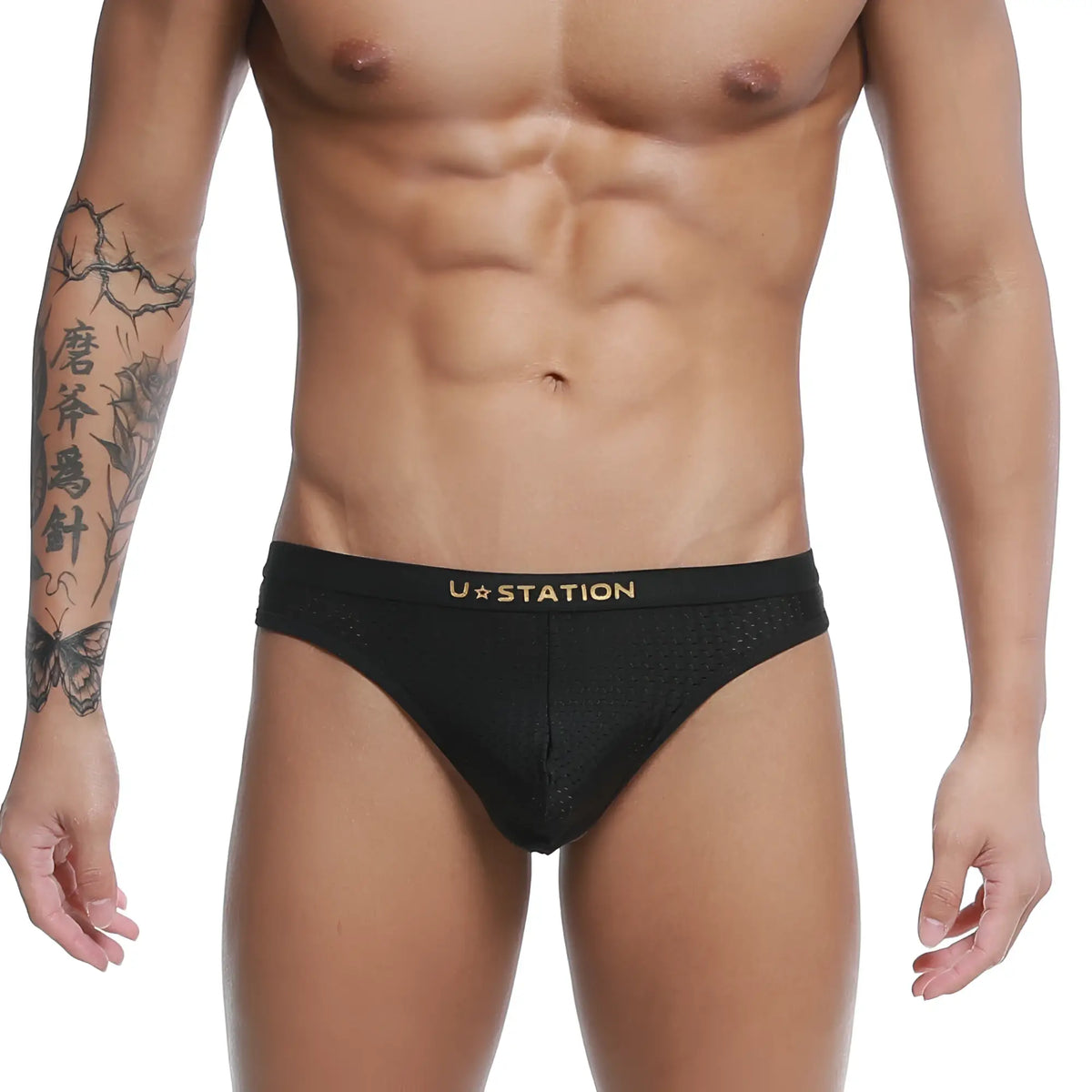 Black u-station seduction thong briefs with gold logo and mesh fabric showing front design
