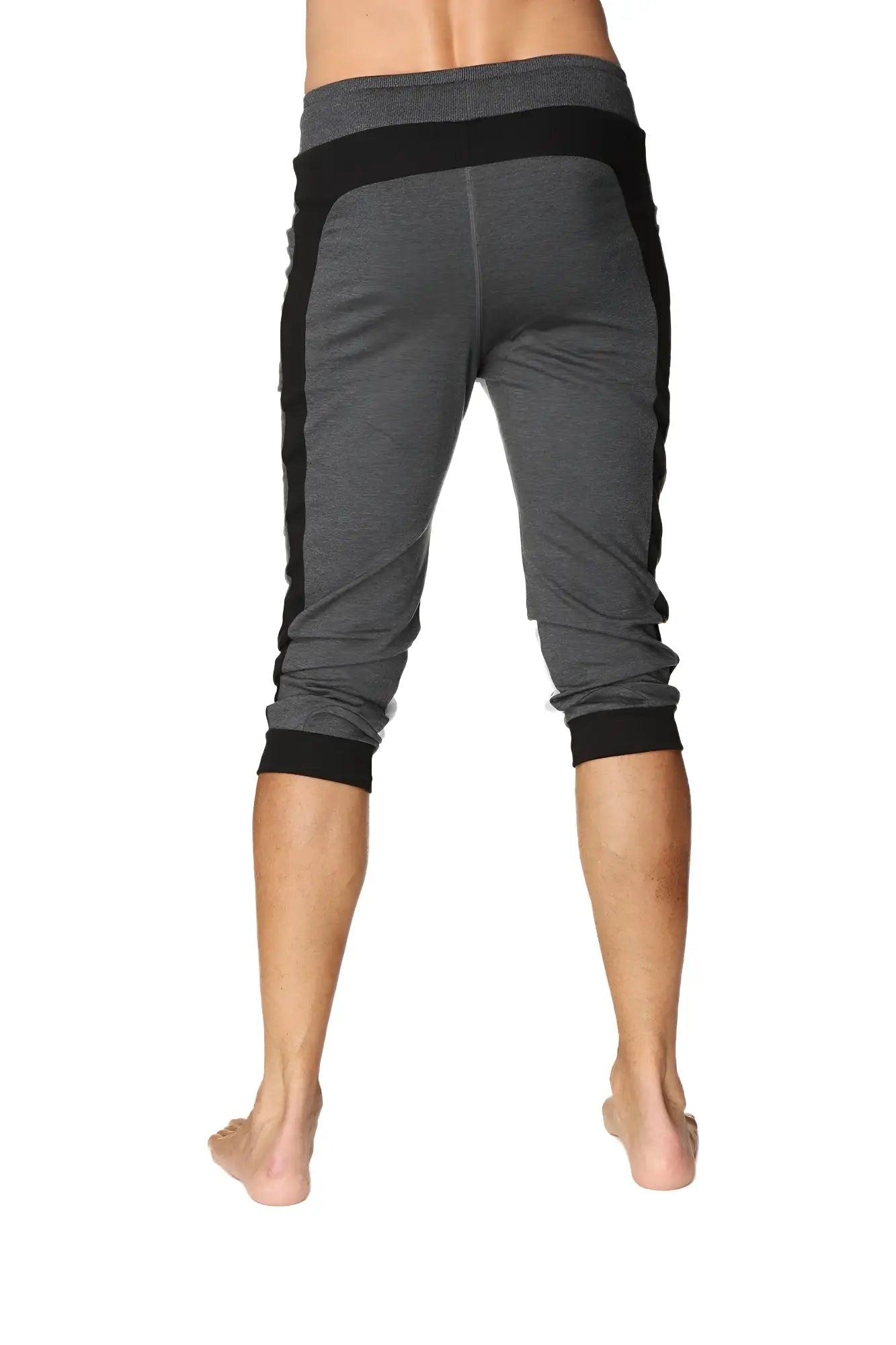 Gray and black ultra-flex tri-color cuffed yoga pant with textured fabric and contrasting side panels for athletic use