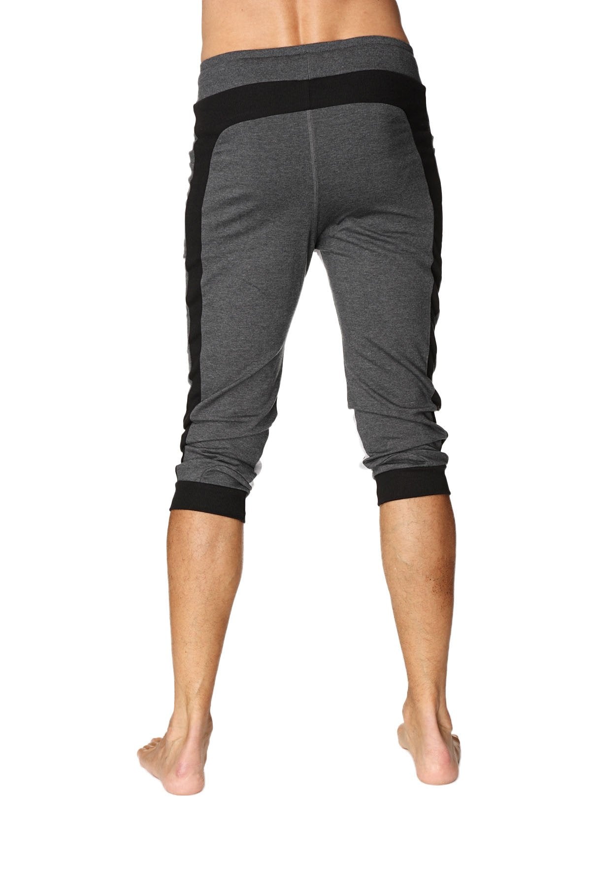 Gray and black ultra-flex tri-color cuffed yoga pant with textured fabric and contrasting side panels for athletic use