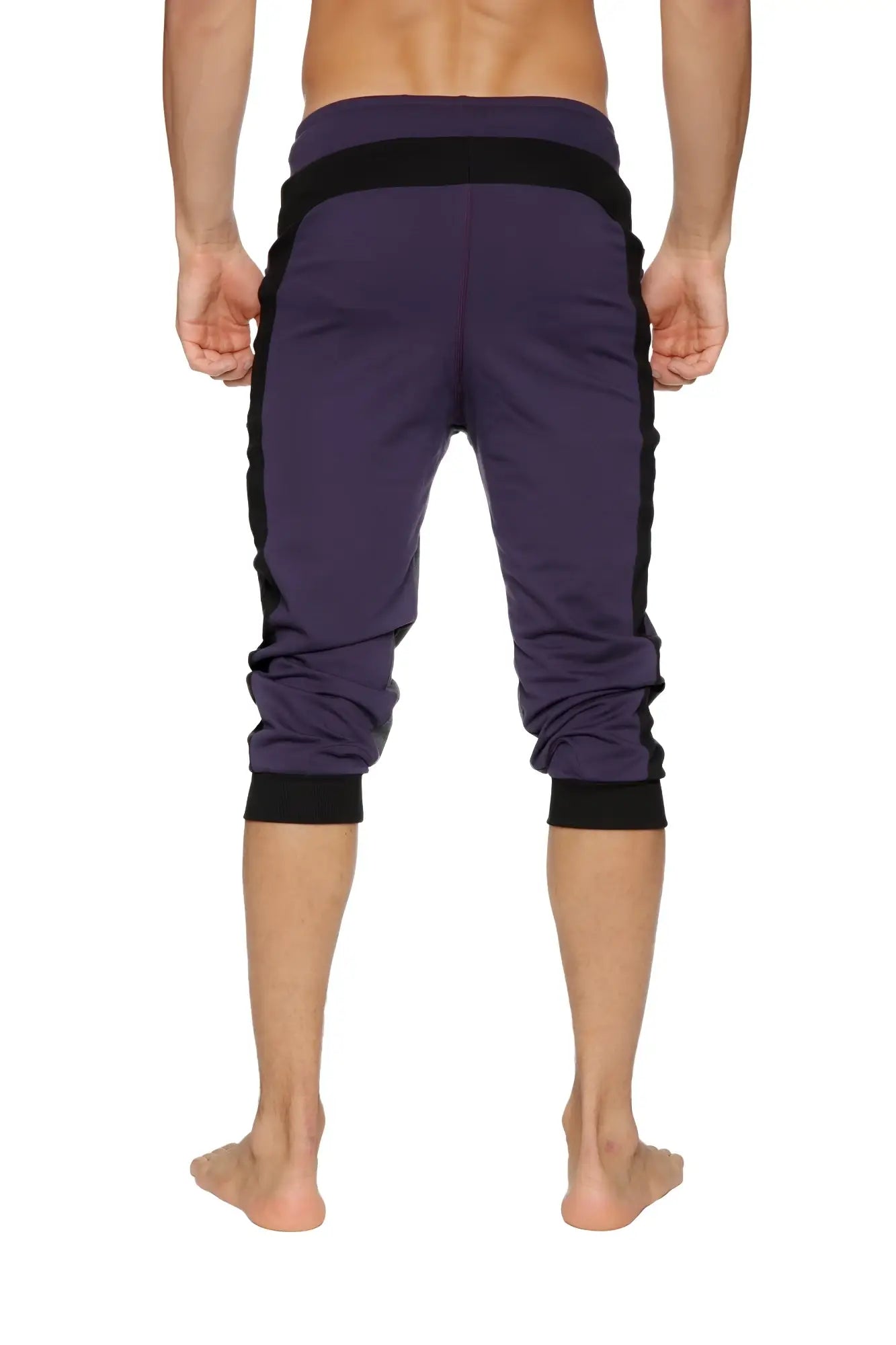 Ultra-flex tri-color cuffed yoga pant in eggplant with black and charcoal panels and elastic cuffs for athletic use