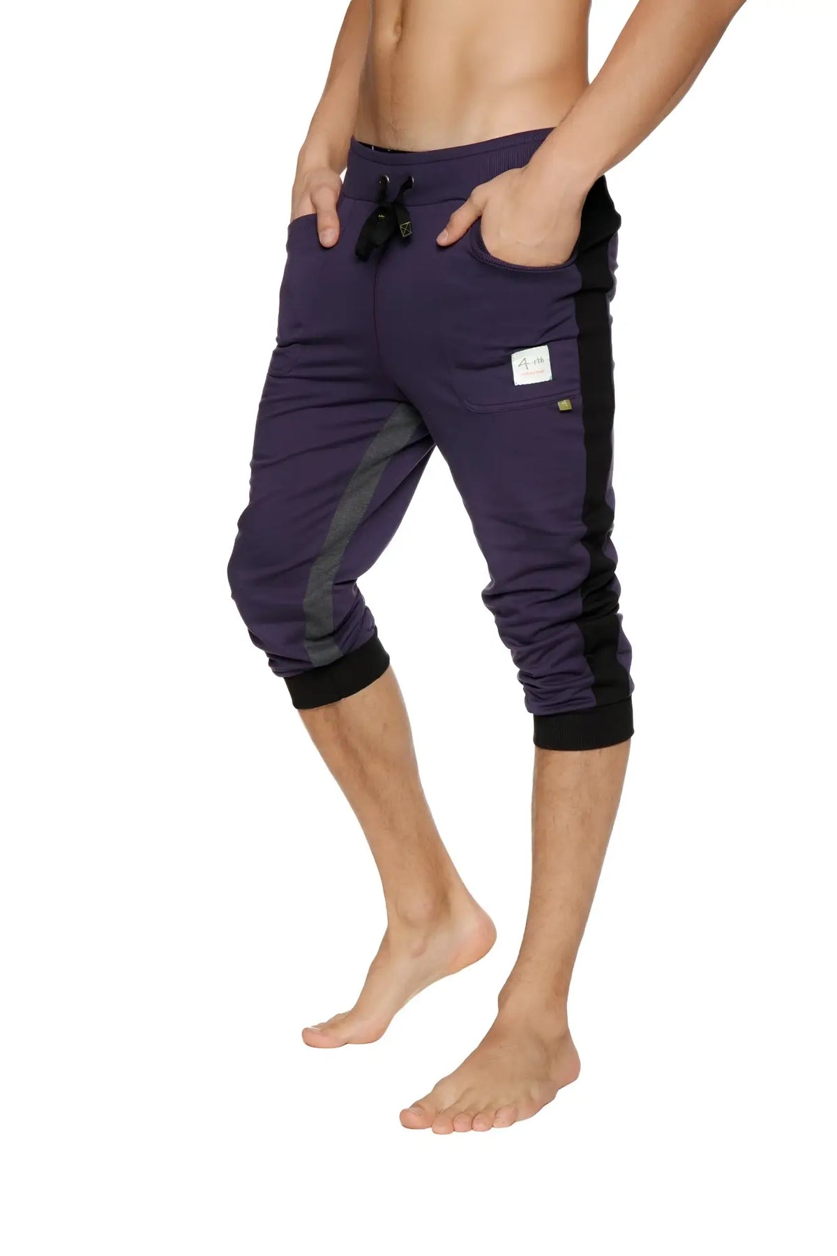 Ultra-flex eggplant capri-length joggers with black side panels and elastic cuffs designed for yoga and comfort