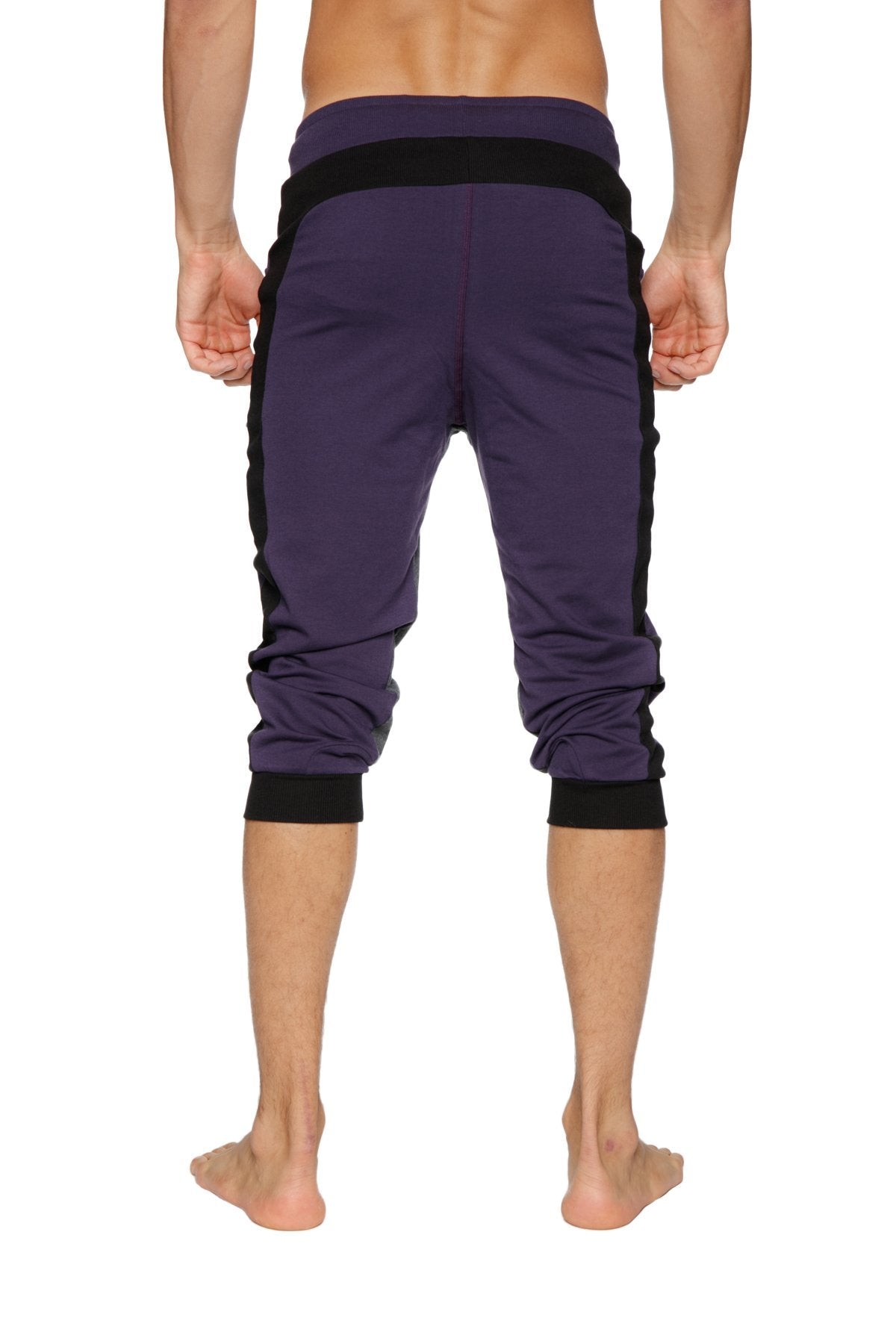 Ultra-flex tri-color cuffed yoga pant in eggplant with black and charcoal panels and elastic cuffs for athletic use