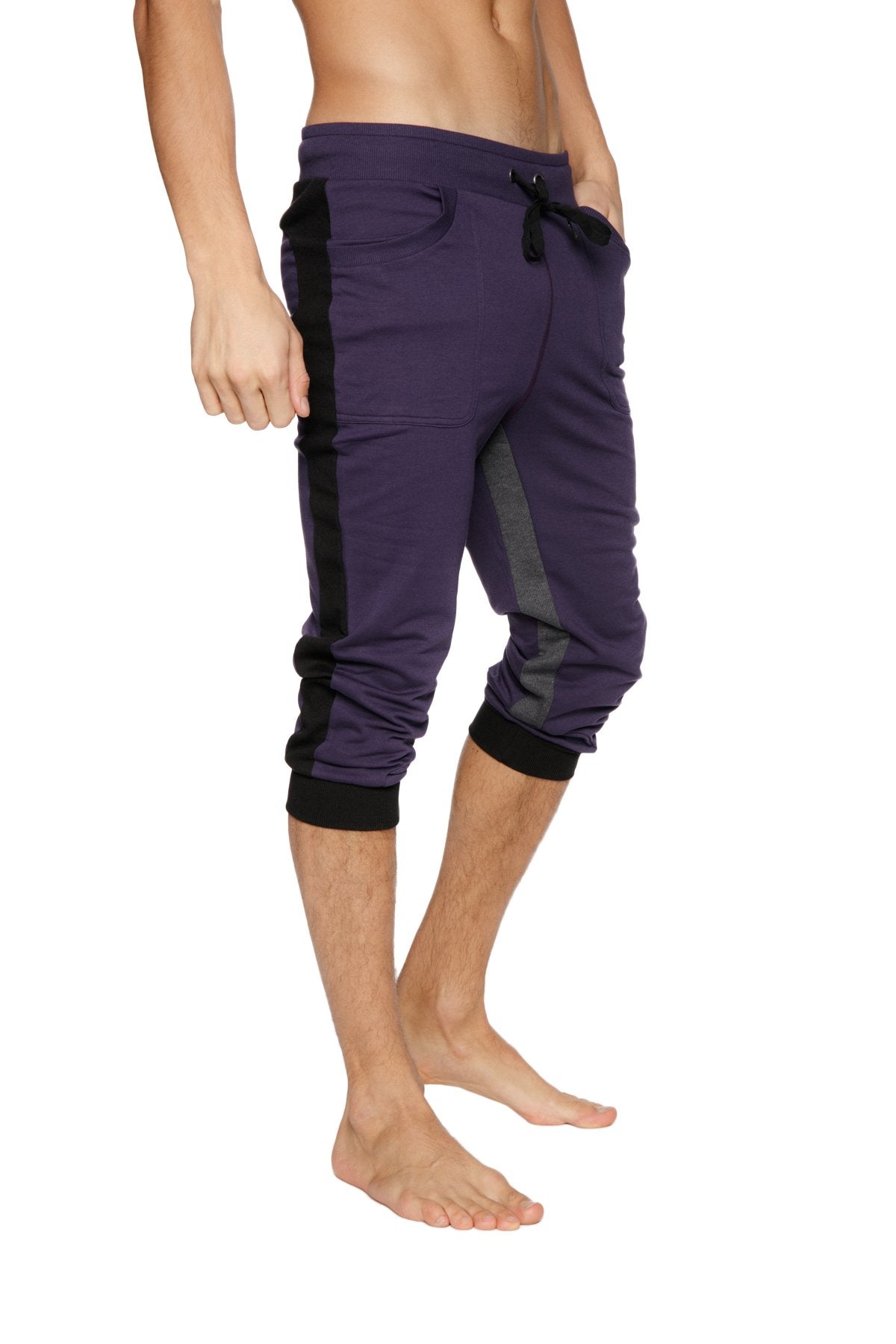 Ultra-flex tri-color cuffed yoga pant in eggplant with black and charcoal side stripes and elastic cuffs
